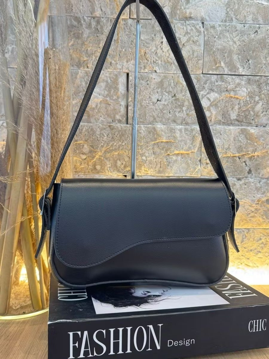 Bolsa tampa assimétrica