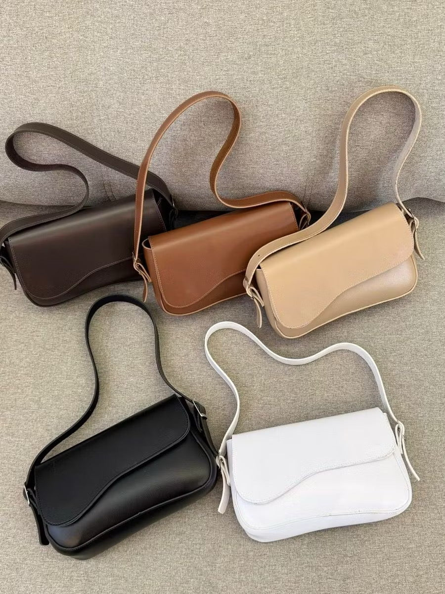 Bolsa tampa assimétrica