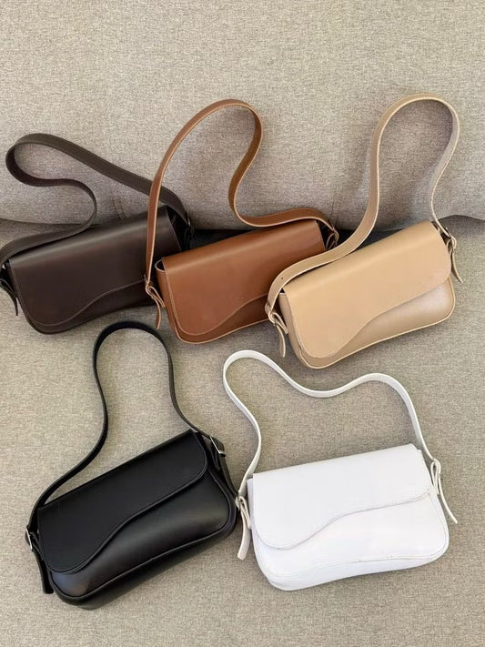 Bolsa tampa assimétrica